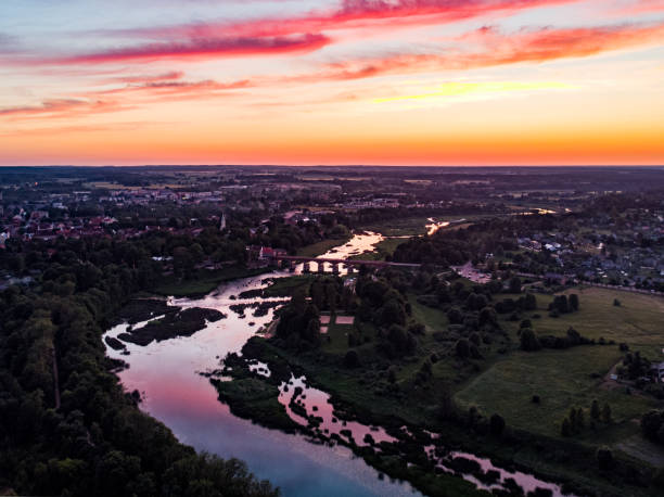 istock Areal countryside sunset view with river Venta. 1273886832