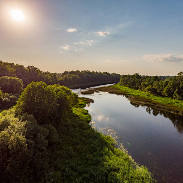 istock Areal countryside view from drone with small river Venta. 1273886884