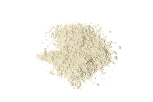 istock Green cosmetic or make up powder sample isolated on white. 1273888611