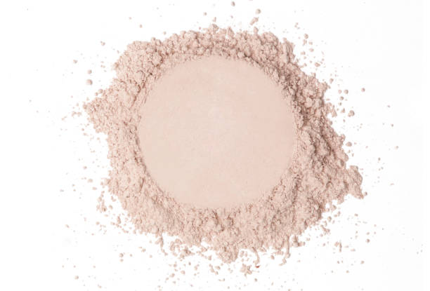 istock Cosmetic or make up powder isolated on white. 1273888660