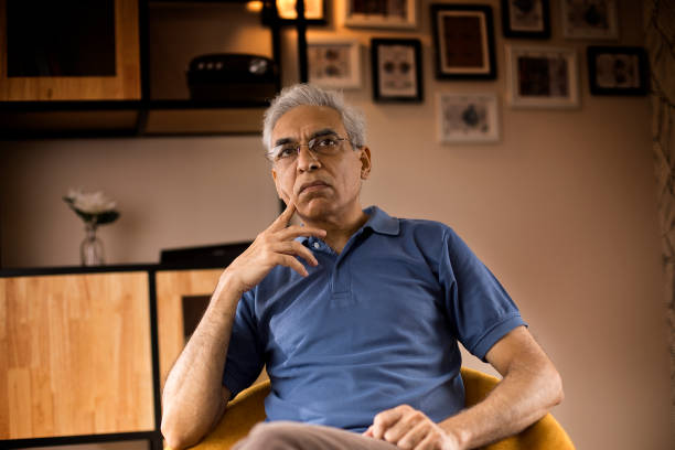 istock Thoughtful old man at home 1273894552