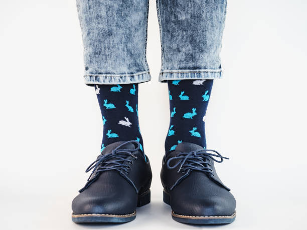 istock Men's legs, trendy shoes and bright socks 1273896393