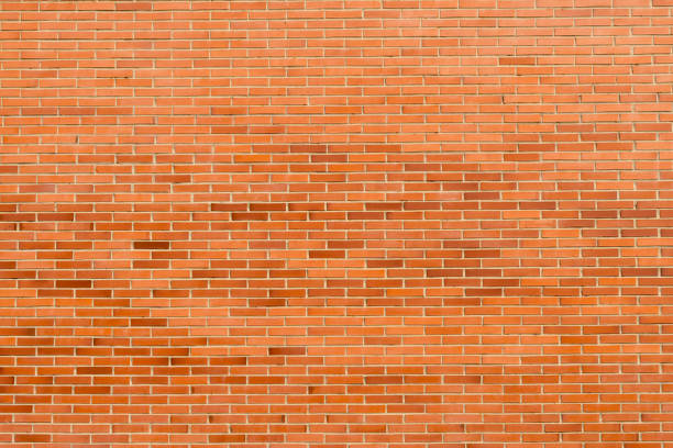 Brick wall, texture of red stone blocks background