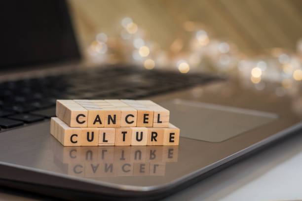 CANCEL CULTURE letter blocks concept on laptop keyboard