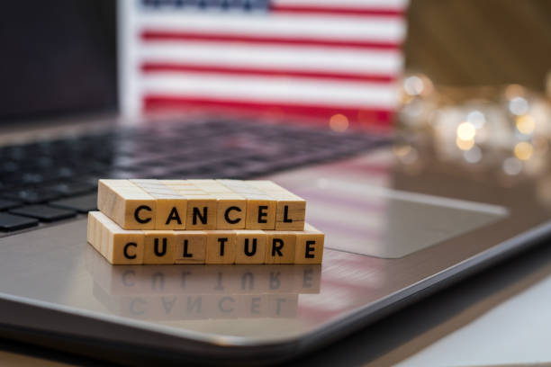 CANCEL CULTURE letter blocks concept on laptop keyboard