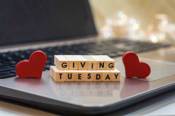 istock GIVING TUESDAY letter blocks concept on laptop keyboard 1273898314