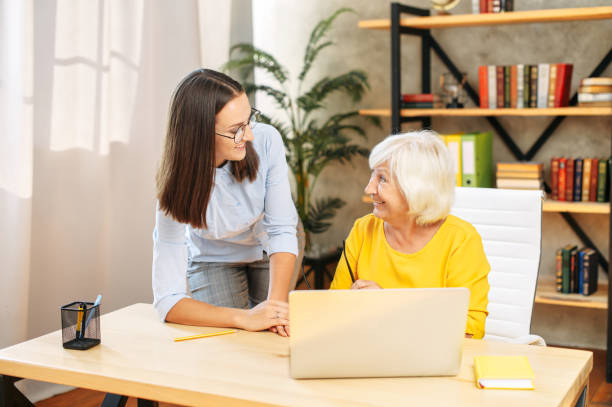 istock Two female colleagues in the office using a laptop 1273899003