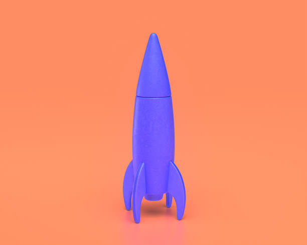 istock Plastic rocket , indigo blue spaceship on pinkish orange background, 3d rendering 1273901984