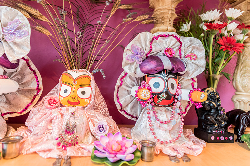 Idols of Hindu God Jagannath, Balaram and Goddess Subhadra Beautifully Decorated on the Altar