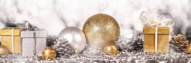istock panorama with shiny gold and silver christmas decoration 1273903862