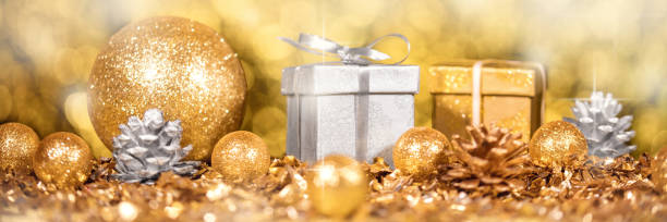 istock panorama with shiny gold and silver christmas decoration 1273903964