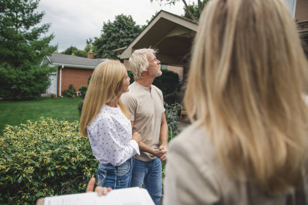 istock Couple and Their Real Estate Agent 1273907991