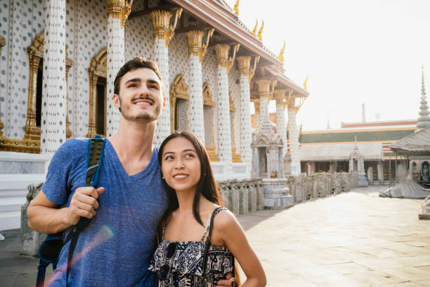 istock Young couple exploring a temple in Bangkok 1273911612