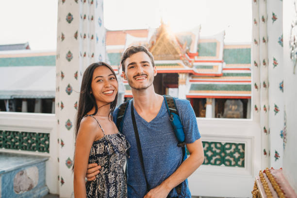 istock Young couple exploring a temple in Bangkok 1273911614