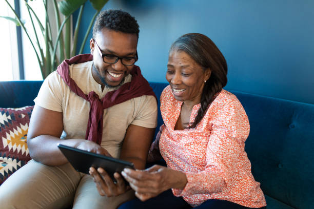 istock Volunteer and an Elderly Lady 1273911753