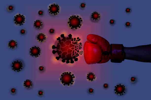 istock Use the hand that is wearing a glove to punch the coronavirus. 1273912005