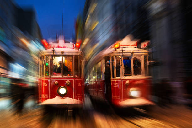 istock Red tramway in Istanbul at night 1273914715