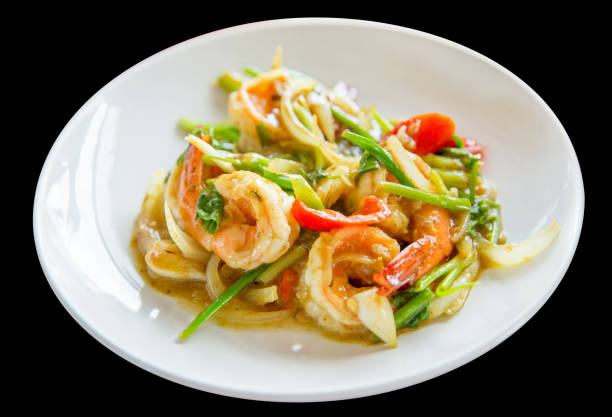 Stir-fried Shrimp and squid in Curry Powder die cut in the white plate.