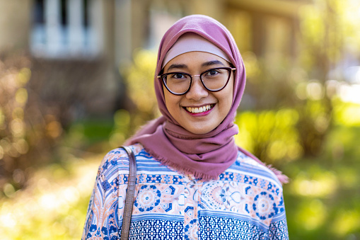 Portrait of a confident Muslim girl looking at camera