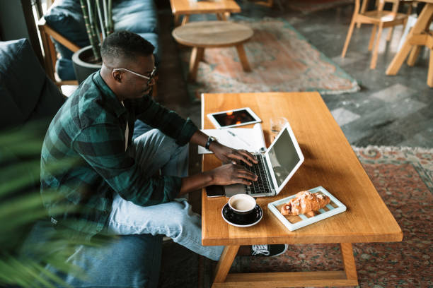 istock Side view of a young African American man working 1273917882
