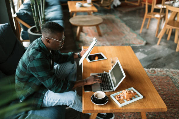 istock Side view of a young African American man working 1273917891