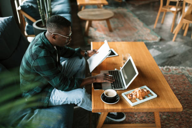 istock Side view of a young African American man working 1273917930