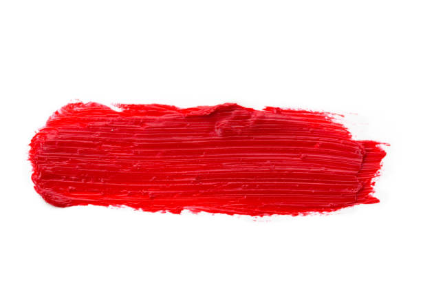 istock Lipstick smear smudge swatch isolated on white background. Cream makeup texture. Bright red color cosmetic product brush stroke swipe sample 1273918040