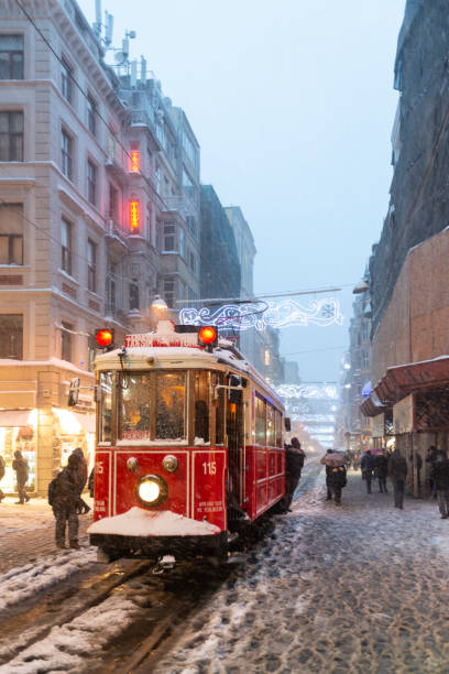 istock Red tramway in Istanbul at night 1273920276