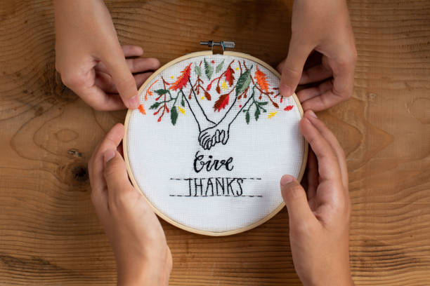 istock Giving an embroidery present for Thanksgiving 1273922272