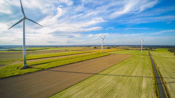 istock Wind farm surrounded by blooming rapeseed. 1273923163