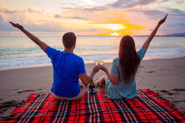 istock Family having a picnic on the beach 1273925100
