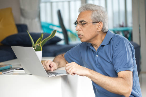 istock Senior man working from home 1273925235