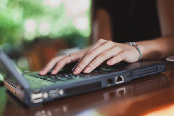 istock Beautiful young women enjoying in coffee shop while using a laptop 1273927879