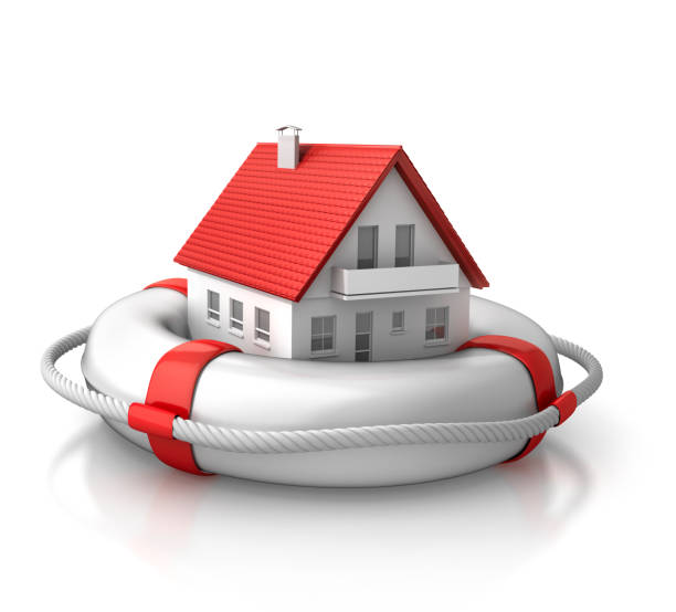 istock Red and white life saver with toy house 1273929331