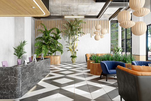 Lobby With Reception Desk And Lounge Area With Plants