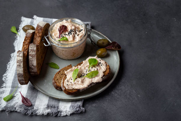 tuna rillettes with cream cheese and anchovies tuna rillettes with cream cheese and anchovies and fresh bread tuna pate stock pictures, royalty-free photos & images