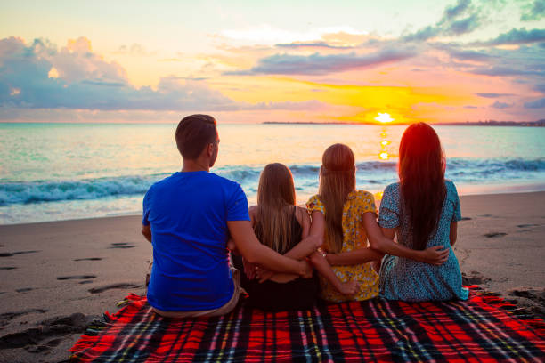 istock Young family on vacation at the evening 1273930128