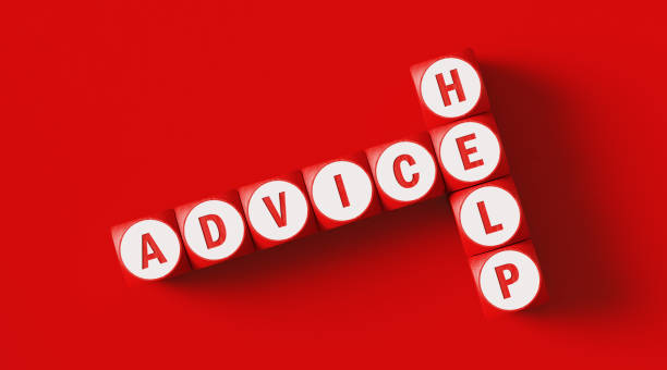 istock Help and Advice Written Woodblocks Sitting on Red Background 1273931030