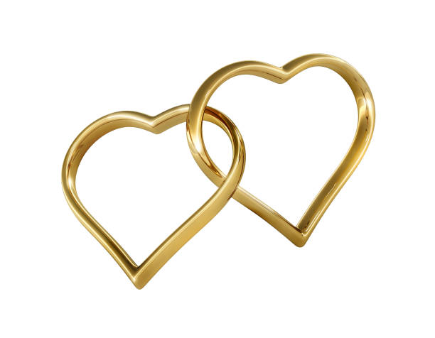 istock Heart shaped golden wedding rings 1273931050