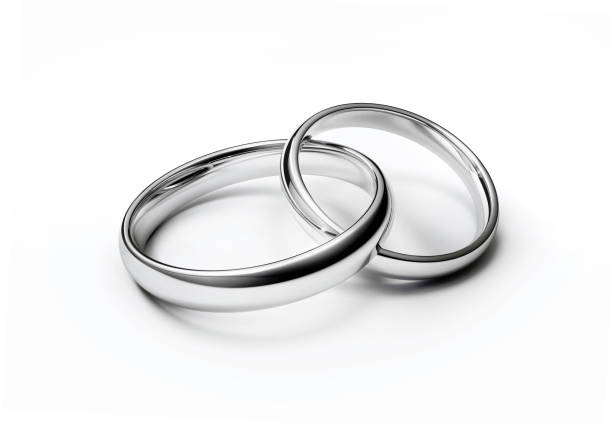ゴールデン結婚指輪 - interlocked ストックフォトと画像