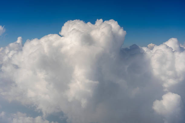 istock White clouds and blue sky, a view from airplane window 1273931239