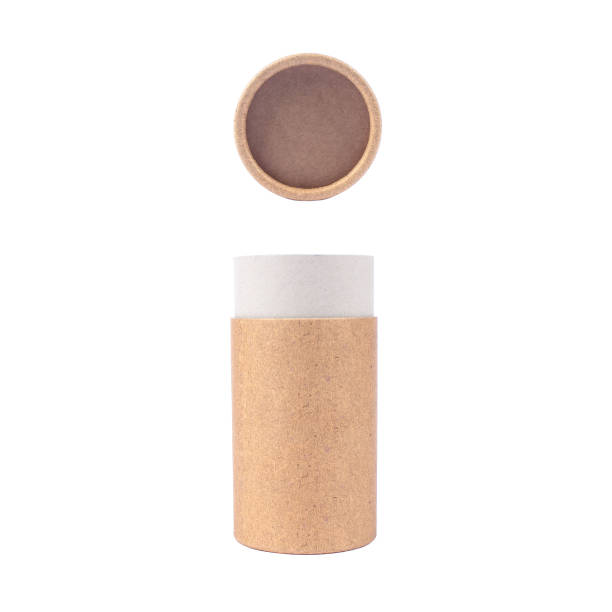 istock Recyclable paper tube with paper cap, cardboard container for packaging isolated on white background with copyspace, mockup. Recyclable packaging and zero waste concept 1273934520
