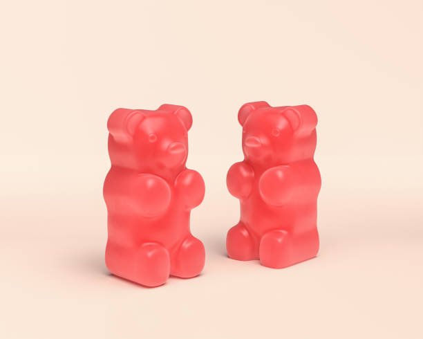 istock bear Jelly candy, 3d icon dessert, monochrome solid red color on light background, Miniature plastic style sweets, 3d Rendering 1273936334