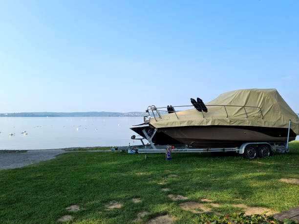 istock covered boat at lake 1273938223