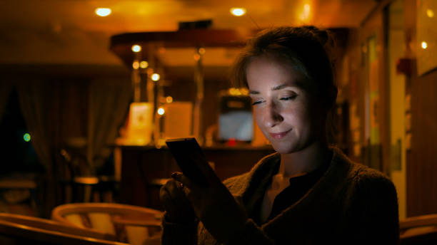istock Woman using smartphone in cafe 1273982674