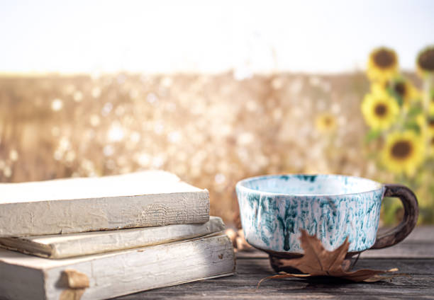 istock Autumn composition with books and a beautiful Cup 1273982891