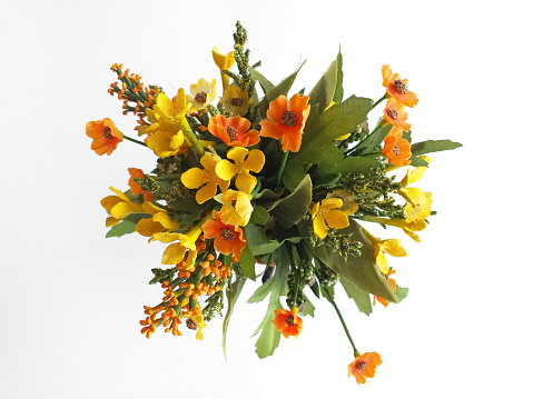 Spring flower bouquet with green leaves. Colorful holidays decoration