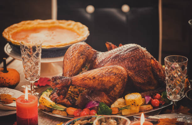 istock Traditional Stuffed Turkey Dinner with Side Dishes for Thanksgiving Celebration 1273999374