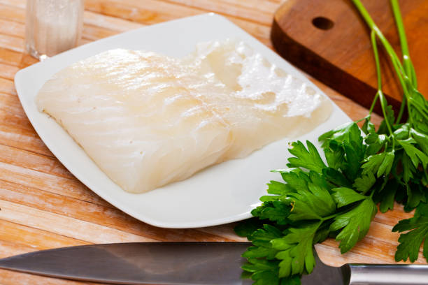 istock Raw seafood, fresh eel fillet on wooden board 1274015491