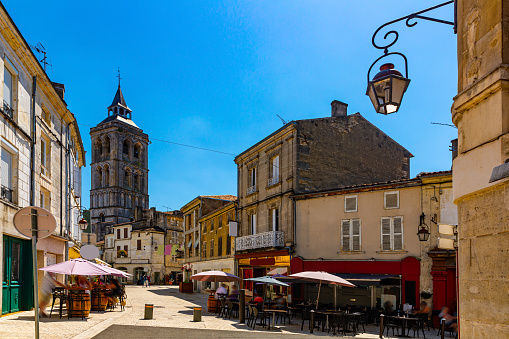 Cognac street viw con campanario de la iglesia de San Leger photo